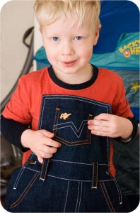 Trying on his new hand made overalls - gotta love a boy in overalls!