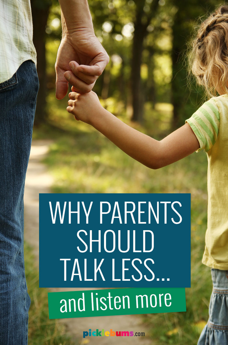 close up photo of child holding hand with adult walking outside with text - why parents should talk less and listen more