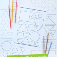 printed pages of shape drawing prompts with pencils