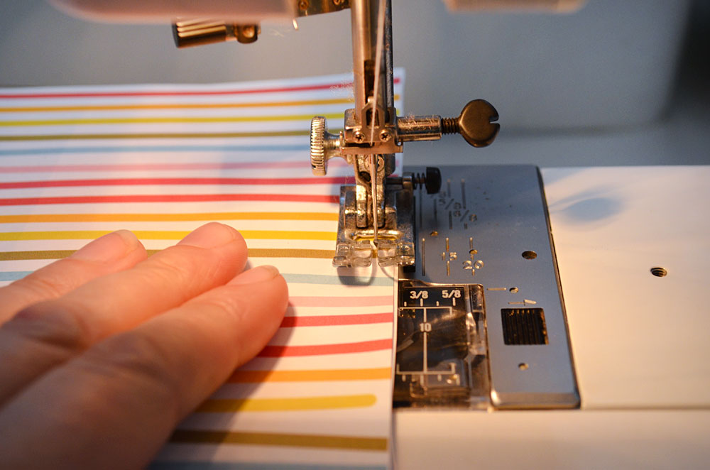 sewing paper on a sewing machine