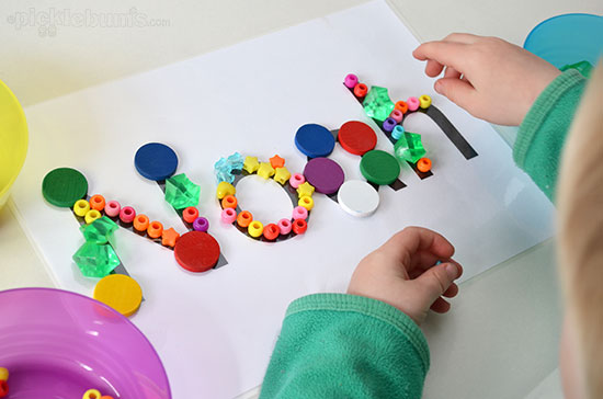 Learning Your Name - three playful ways to help kids learn to recognise their own name using a simple name card. 