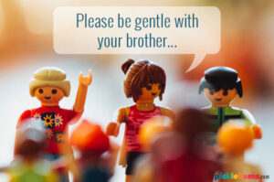 Play mobil figurines with a speach bubble saying please be gentle with your brother