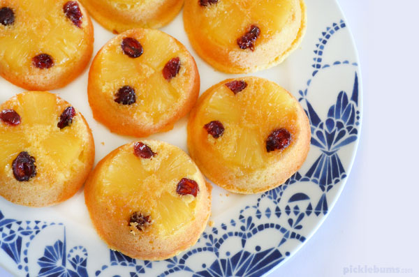 pineapple upside-down cupcakes on a plate