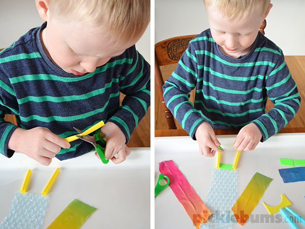 Try this simple sticky cutting tray invitation to play and find out why your kids don't need fancy or expensive activities to learn important skills 
