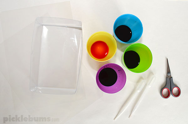 Water Colours on Plastic - a magical see-through painting activity