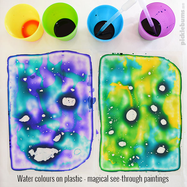 Water Colours on Plastic - a magical see-through painting activity