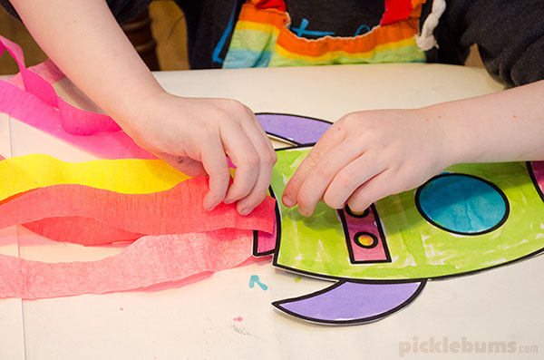 Make a super swishy flying rocket! Use our free printable template and step by step instructions 