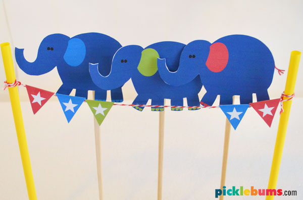 elephants balancing puppets