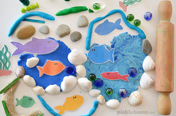 sea playdough with fish and rolling pin