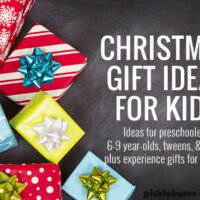 wrapped gifts on black background with text - Christmas gift ideas for kids