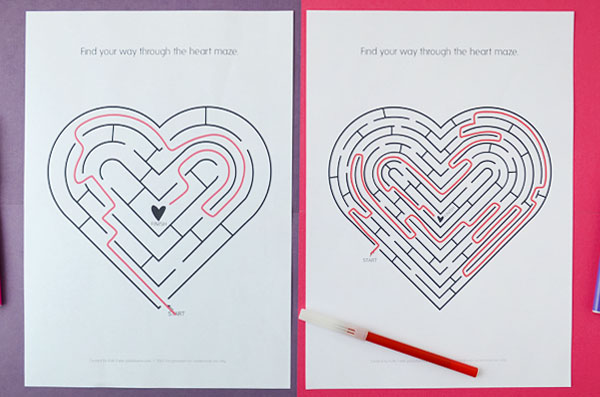 two printed heart mazes with solution showing