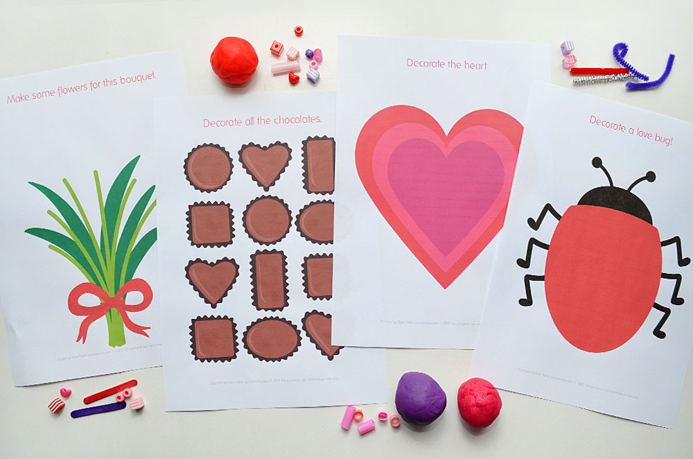 four Valentines' day themed playdough mat printables on white background with playdough and beads