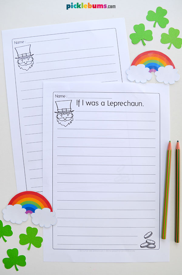 two printed leprechaun writing worksheets on white background with pencils rainbows and shamrocks beside it