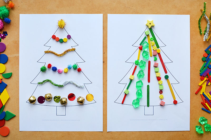 printed Christmas tree pattern mats decorated with loose parts