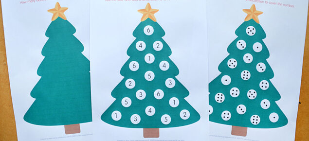 Three printed christmas tree math game mats