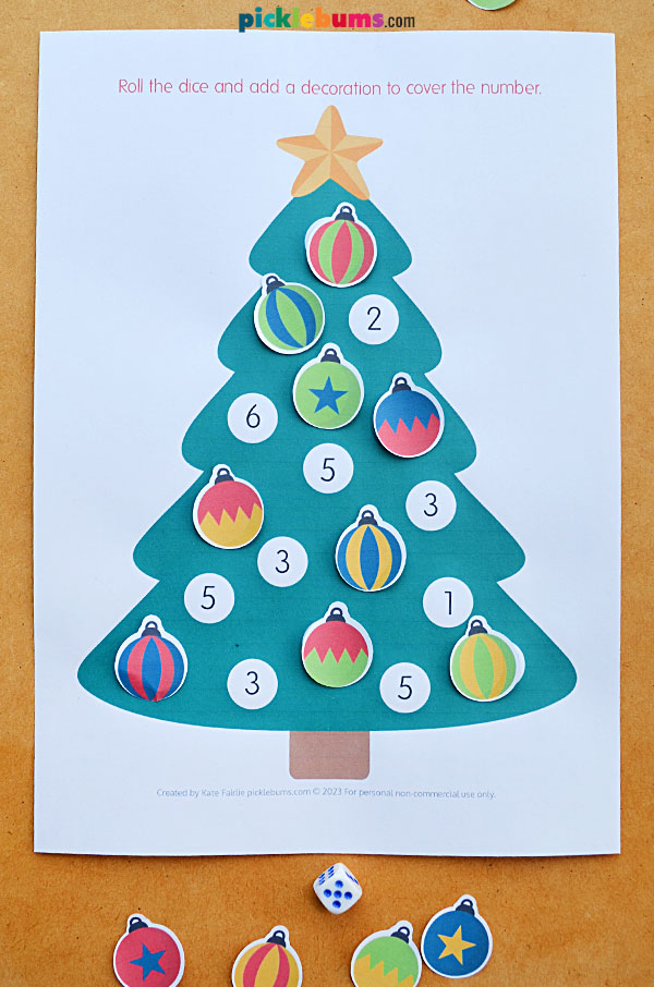 Printed Christmas tree roll and cover math game