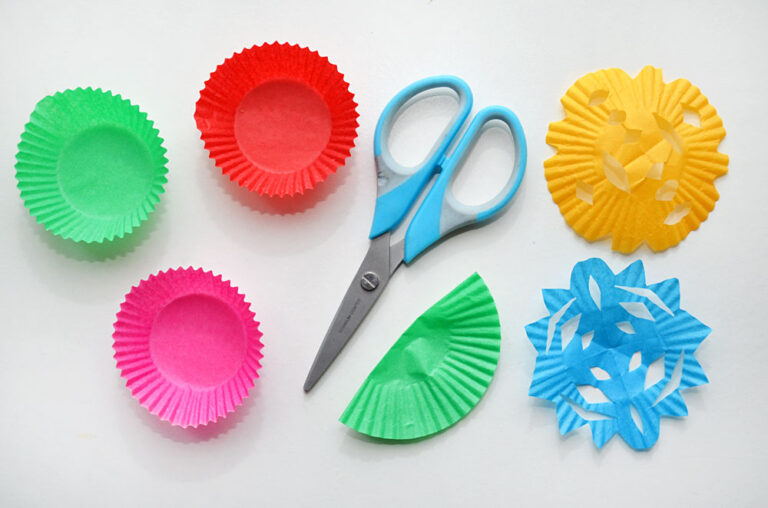 cupcake liners and scissors - supplies to make cupcake liner snowflake craft